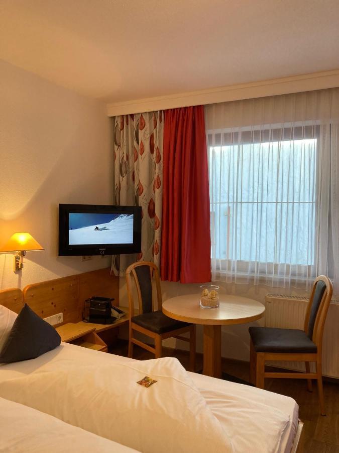 Am Romerweg 4*